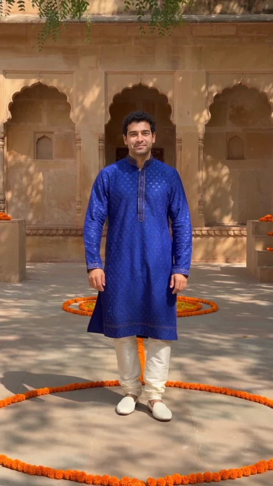 Opening moment of the generated dance, full-body adult in a blue kurta