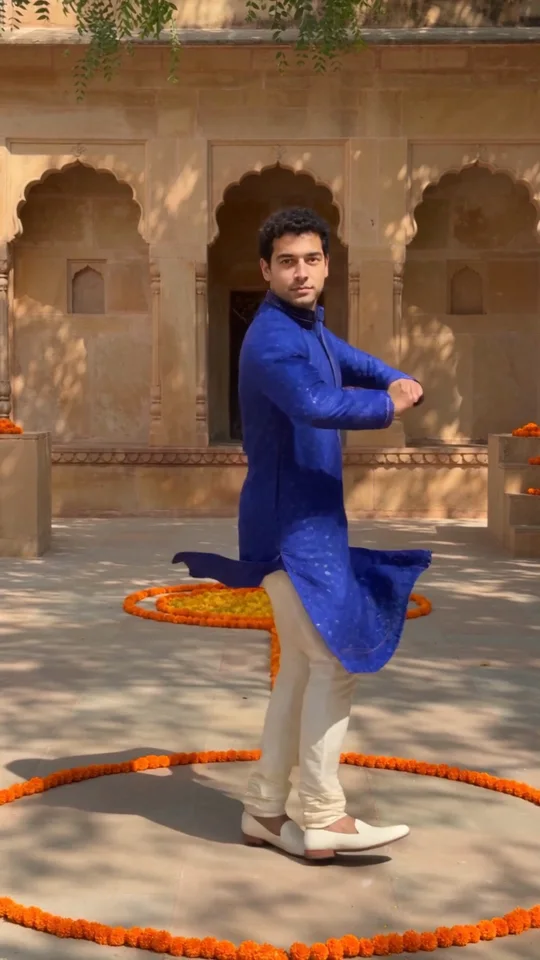 Middle of the generated Bollywood-inspired dance, performer turning in the courtyard