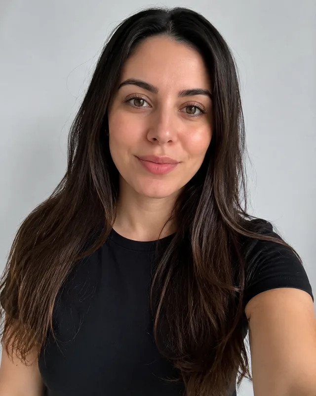 Sample source photo: a person with a neutral, relaxed expression on a plain studio background
