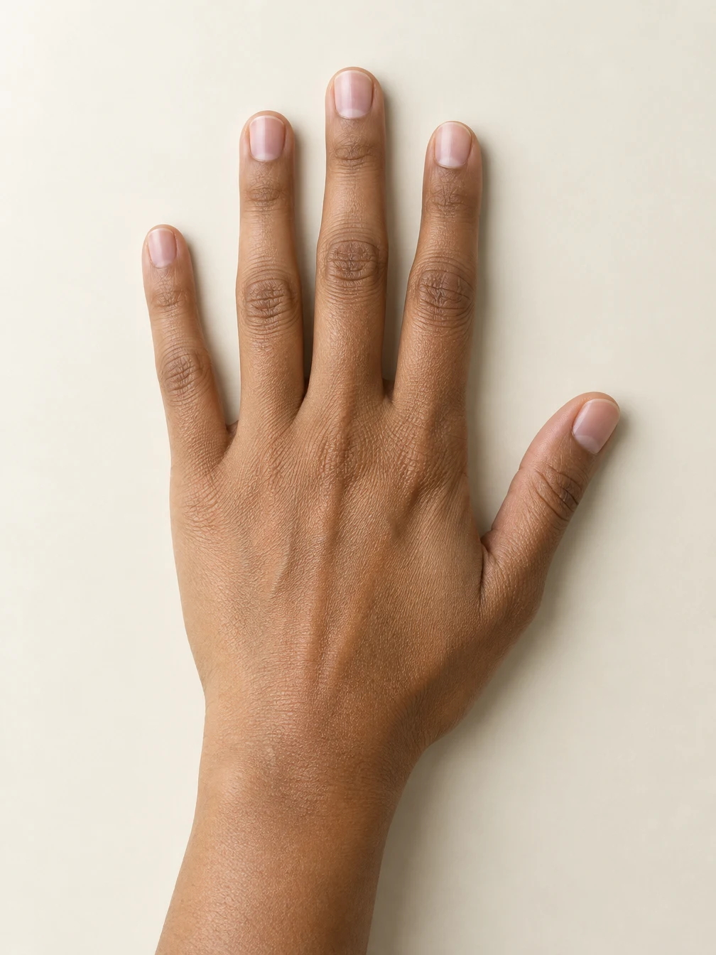 Fictional adult hand with bare nails used for all three examples
