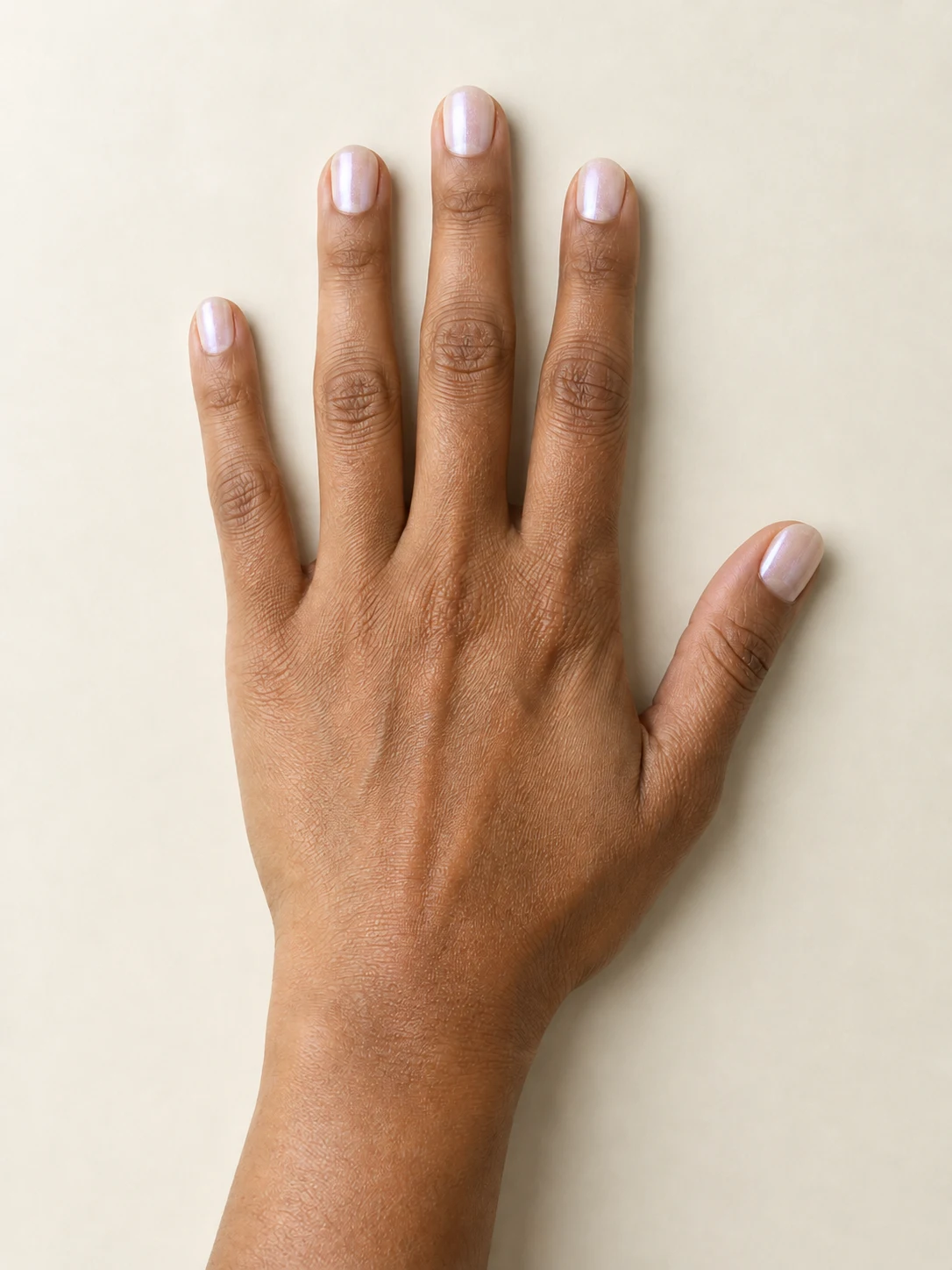 Actual AI Nail Pearl shimmer result with a subtle ivory finish