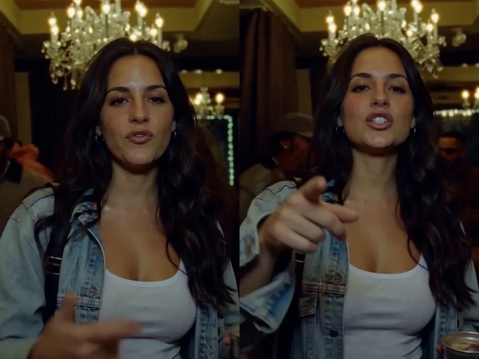 A woman from one photo pointing at the camera in the Burning Bridges AI party scene
