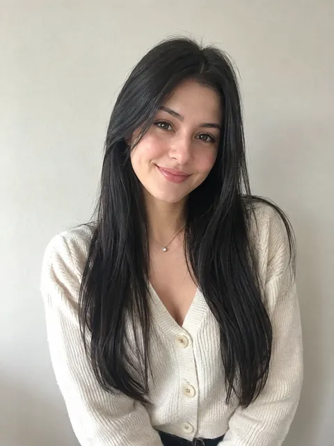 Example photo of the second person, a woman in a cream cardigan
