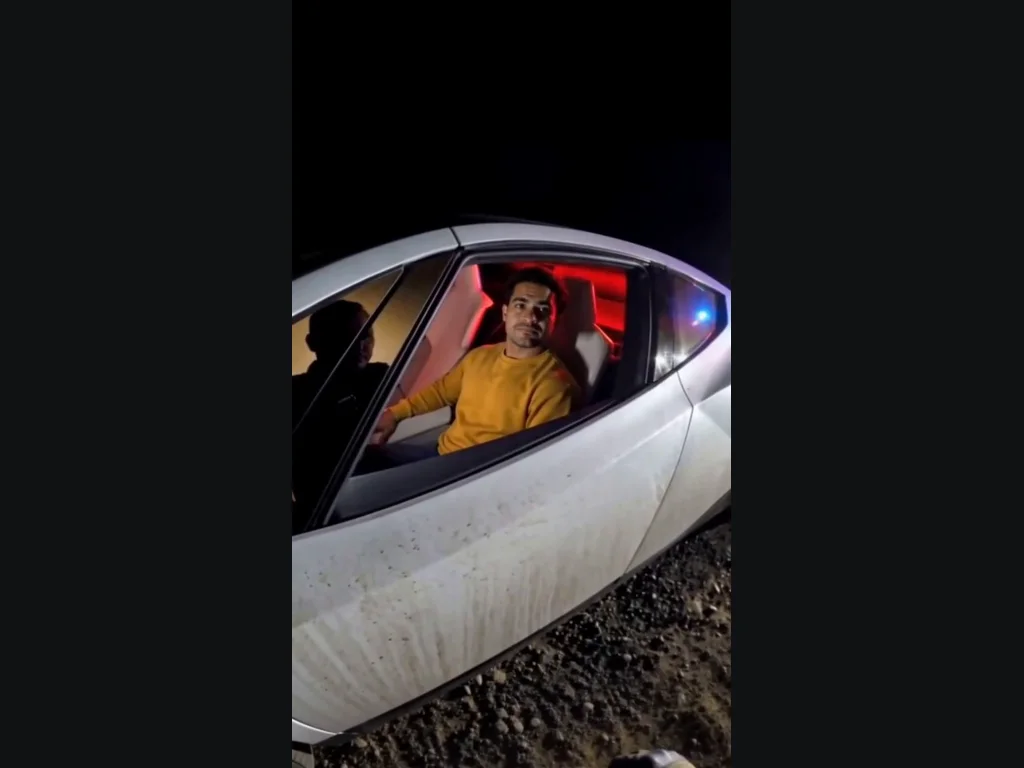 Tesla Roadster AI generated example, driver visible through the window